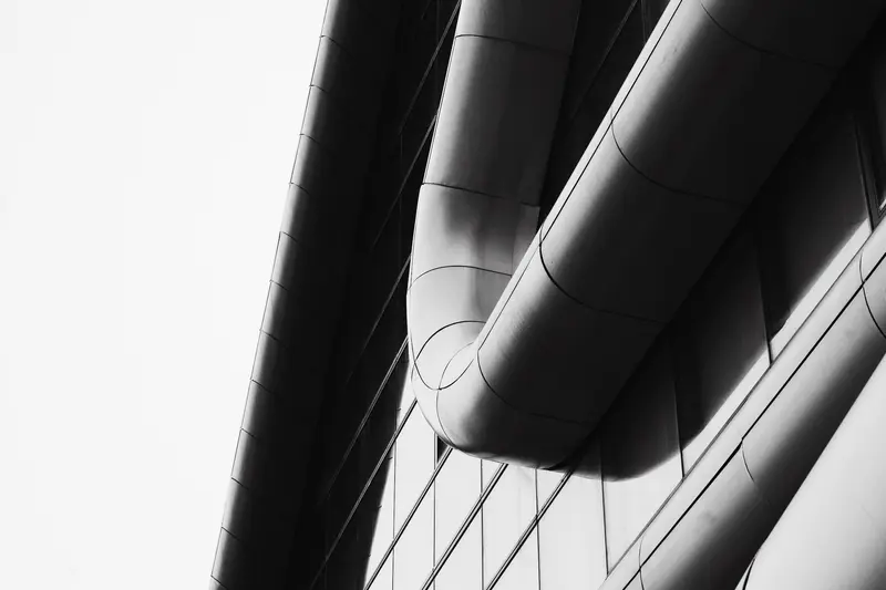 The curved window bands of a modern building.